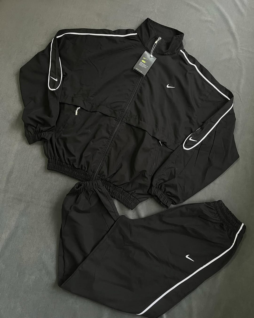 Men's Solo Swoosh Woven Track